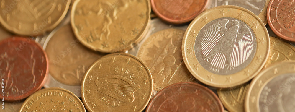 European money euro coins. Shiny coins of European union currency close up European money euro coins. Shiny coins of European union currency close up