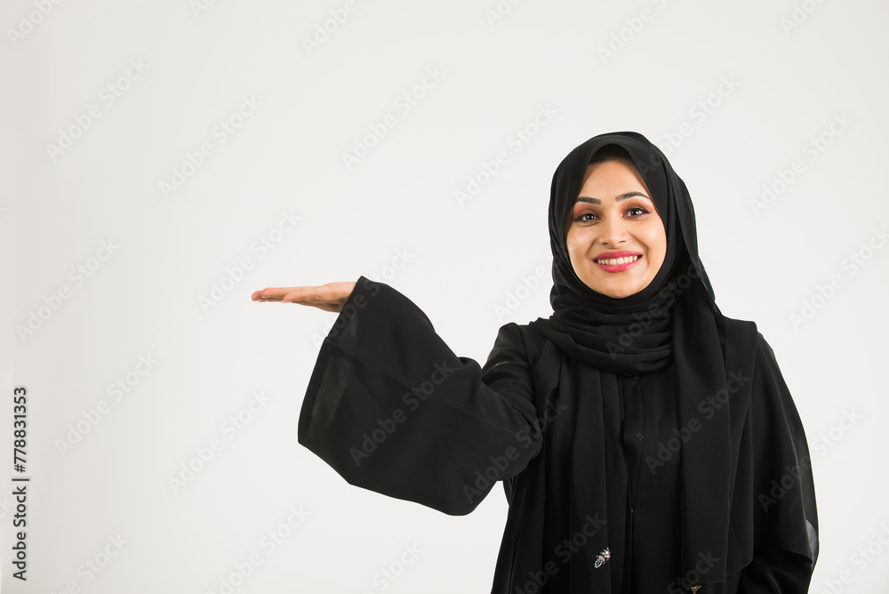 Arabic woman with abaya in studio Arabic woman with abaya in studio