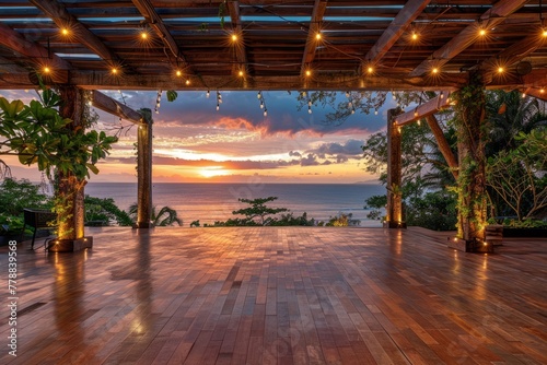 Open-air dance floor with breathtaking ocean view at sunset
