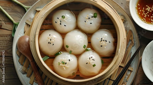 Chinese steamed dumpling dim sum in bamboo steamer. Top view