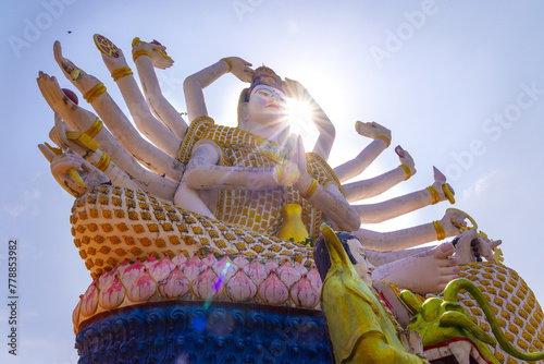 Majestic Multi-Armed Statue in Thailand Under the Sun