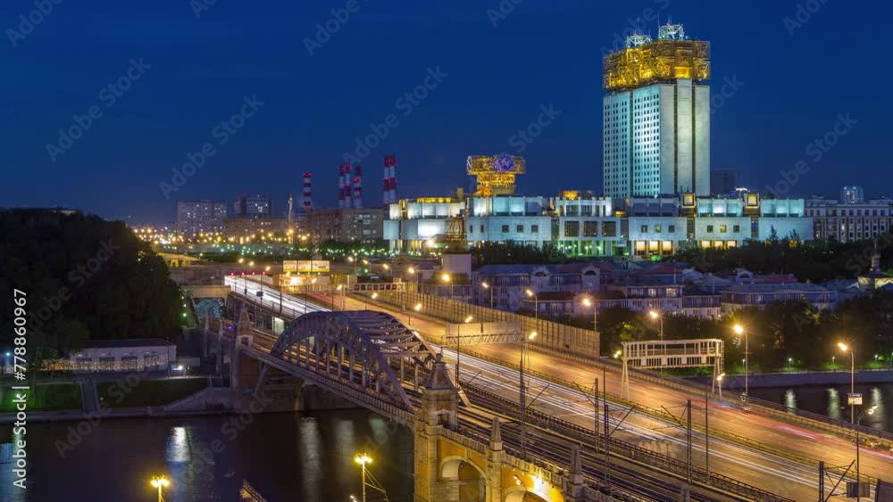 Evening view at the Russian Academy of Sciences day to night transition timelapse and Novoandreevsky Bridge over the Moscow River. Aerial view from rooftop after sunset Evening view at the Russian Academy of Sciences day to night transition timelapse and Novoandreevsky Bridge over the Moscow River. Aerial view from rooftop after sunset