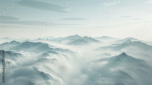 A view of snowy mountains with snow covered peaks covered with fog and snow in winters