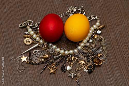 Fancy jewelry necklaces and bracelets with coloured eggs in the middle © Tatty