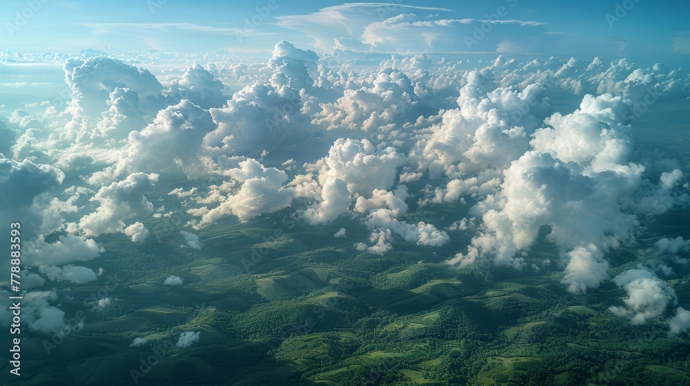   An image captured by an airborne aircraft depicting cloud formations above terrain and water in the foreground