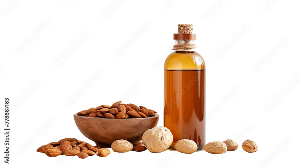 Bottle of argan oil used in cosmetics and healthcare on a whitebackground with argan seeds and a wooden prop on the side Bottle of argan oil used in cosmetics and healthcare on a whitebackground with argan seeds and a wooden prop on the side