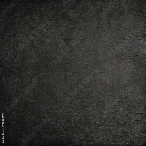 Black paper texture cardboard background close-up. Grunge old paper surface texture with blank copy space for text or design