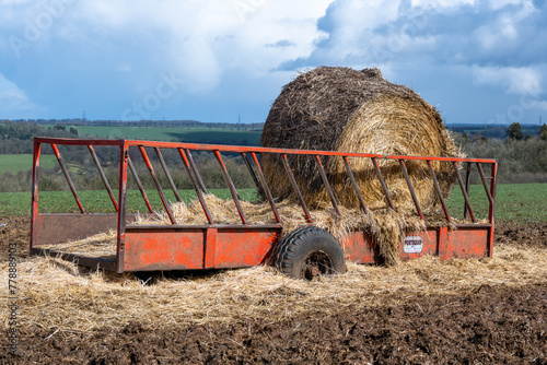 Bale of hay on a trailor photo