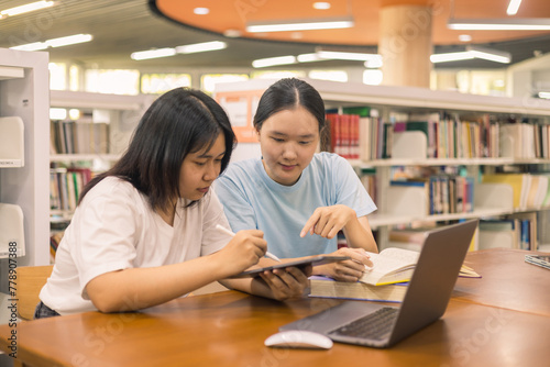 Two young woman, a dedicated student, navigates university life with her friend, embracing education and growth as they pursue their goals together. female student in college