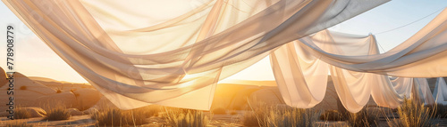 White optic fabric canopy collecting dew in a desert, golden hour, survival innovation