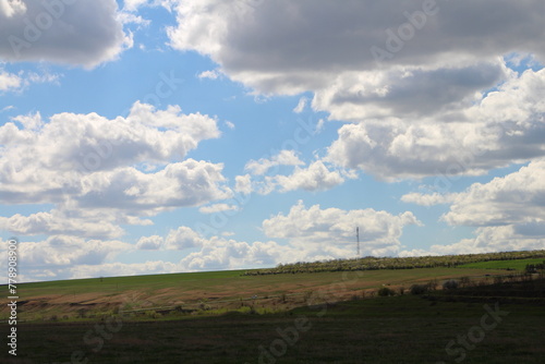 A field with a few clouds