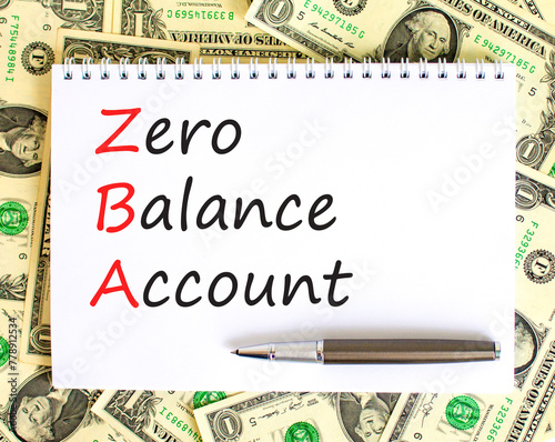 ZBA zero balance account symbol. Concept words ZBA zero balance account on beautiful white note. Dollar bills. Beautiful dollar bills background. Business ZBA zero balance account concept. Copy space. photo