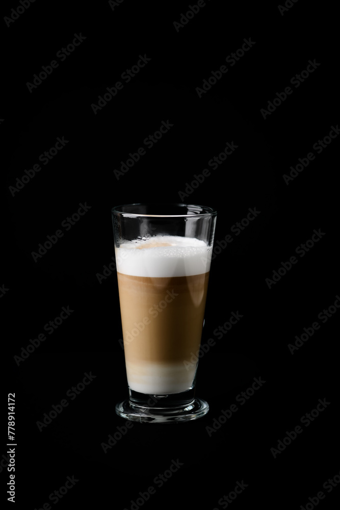 Coffee with milk on dark background. Copy space.
Coffee with milk on dark background. Copy space.