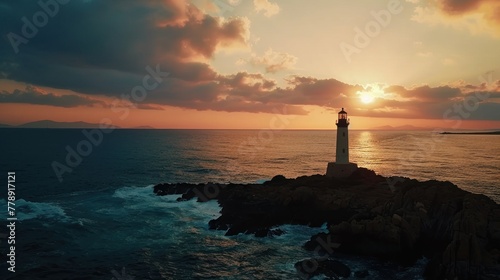 Lighthouse at sunset on the beach