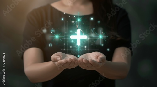 Woman hand holding virtual plus icon for positive thinking mindset or healthcare insurance concept. Mental health care, access to welfare health, life insurance business. Hospital service technology. photo
