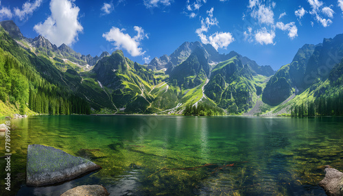 Lake in the mountains, peaceful landscape, beautiful reflective lake in the middle of huge mountains, morning bright blue sky photo