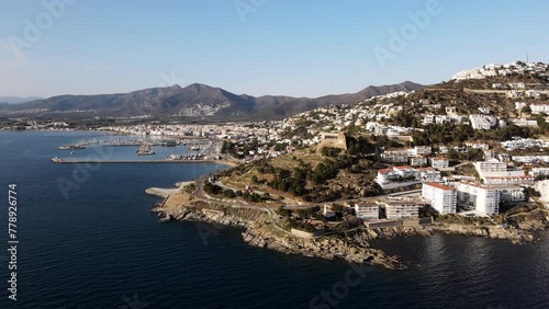 Wallpaper Mural Drone shot of the Castle of La Trinitat overlooking the coastal town of Roses in Spain. Costa Brava during sunset. Torontodigital.ca