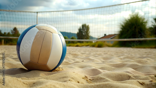 Volleyball Ball on the Sand with Net in Background