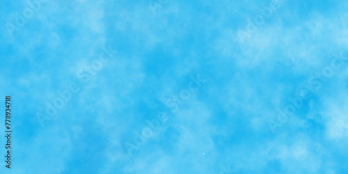 Modern Light sky blue shades watercolor background. Grunge smog texture. blue sky with clouds. blurred and grainy Blue powder explosion on white background. sky background with white fluffy clouds.