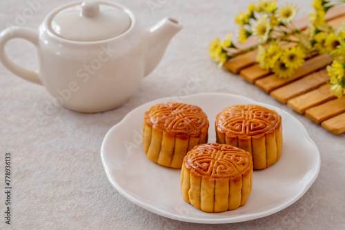 Mooncake on white plate, Chinese mid autumn festival food