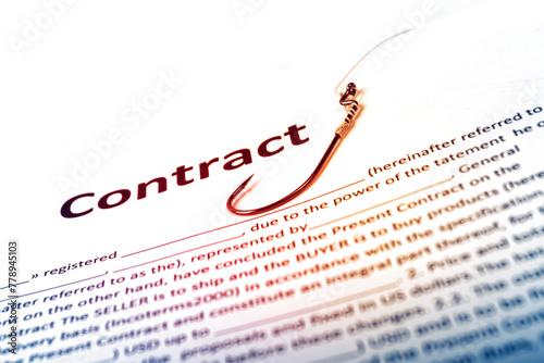 a contract, an inscription on a white piece of paper. there is a fishing hook nearby. the concept of deception when making a deal. close-up. there is a tinting