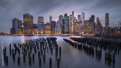 Dramatic view of Lower Manhattan Skyline at Twilight, Brooklyn Bridge Park, New York City, USA