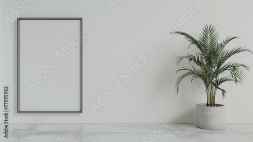 A mockup of an empty grey frame on the white wall.