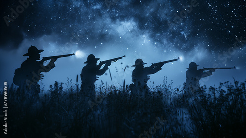 Silhouettes of armed soldiers against a night sky with stars, depicting military action or historical battle reenactment. photo