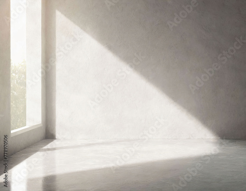 Mockup of a concrete wall with a triangular beam of light falling to the left of a window