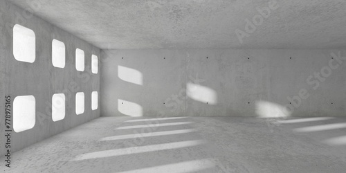 Abstract empty, modern concrete room with square grid openings wall, sunlight shadows and rough floor - industrial interior background template