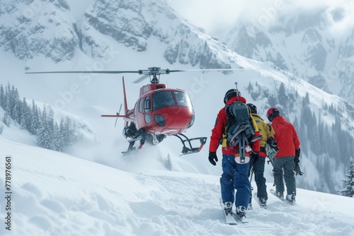 Rescuers carrying injured skier to helicopter in ski area 