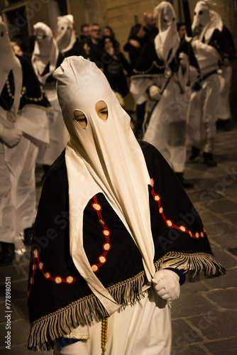 Hooded penitents during the famous Good Friday procession in Chieti (Italy) with their hoods pulled
