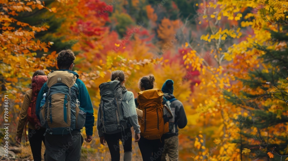 A group of friends embarking on a scenic hike, surrounded by the vibrant colors of autumn foliage.