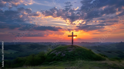 Cross proudly positioned atop hill, framed by expansive sky