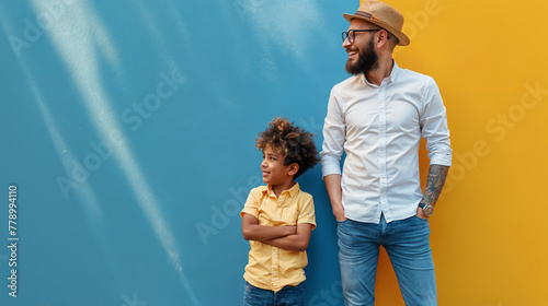 boy and his father leaning against color wall with shadow, generative ai