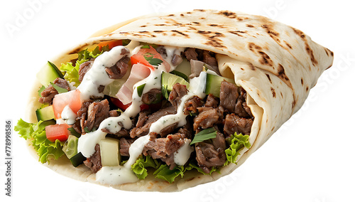 Ginni's beef shawarma with ranch dressing wrapped in soft tortilla on white background photo