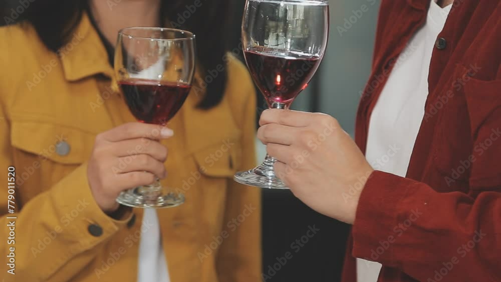 Holiday Event people cheering each other with champagne and wine Holiday Event people cheering each other with champagne and wine