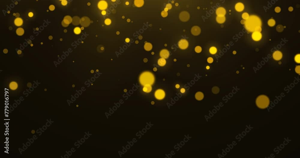 Golden luxury bokeh on particles floating in the air. Dust and glitter ...