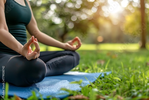 Woman practicing meditation, mindfulness, outdoors wellness. Hobbie and sport, health photo