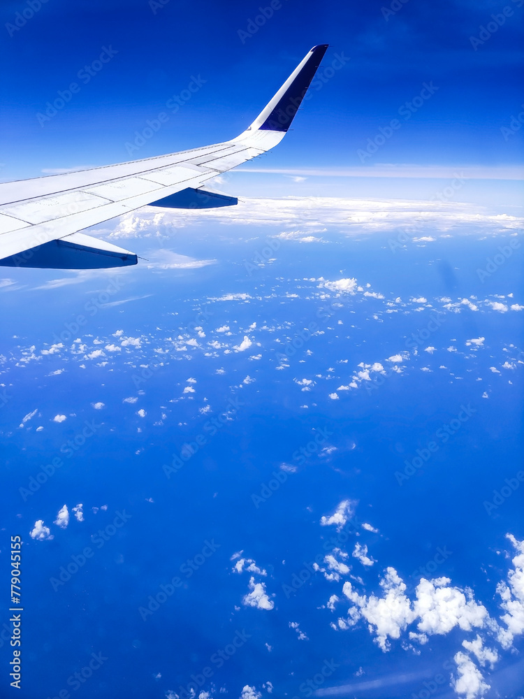 Fototapeta premium A Spectacular Cloudscape Through the Aircraft Window