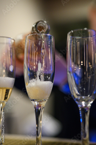 champagne being poured into glass