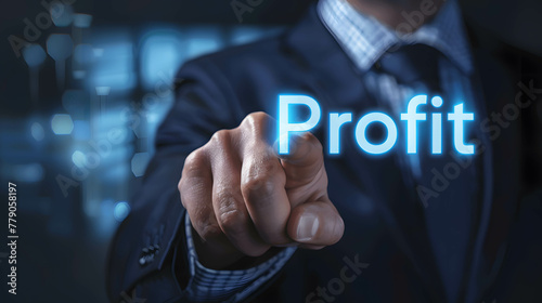 Businessman pointing in to word “Profit”, returns from investments and doing business