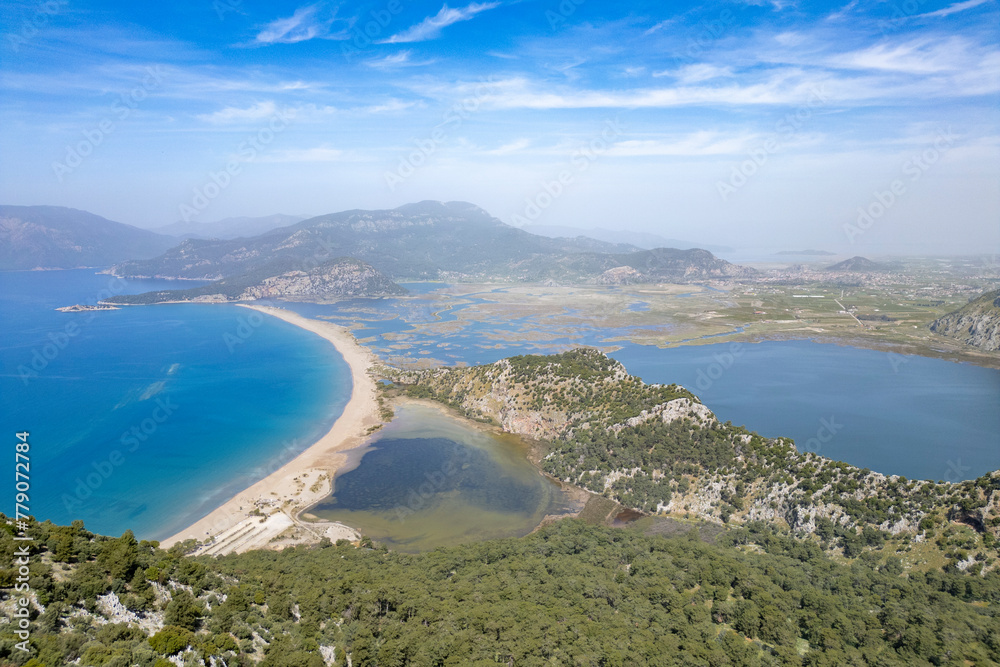 Sulungur Lake and Iztuzu Beach view from hill in Dalyan Village of Mugla Province Sulungur Lake and Iztuzu Beach view from hill in Dalyan Village of Mugla Province