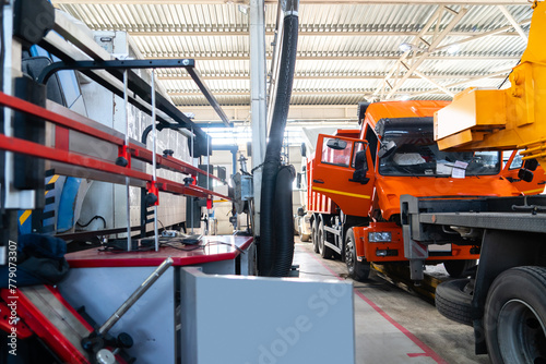 Truck repair service indoors. Maintenance workshop.