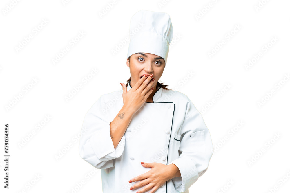 Young woman Chef over isolated chroma key background surprised and shocked while looking right Young woman Chef over isolated chroma key background surprised and shocked while looking right