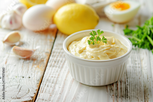 Homemade mayonnaise in a white bowl with parsley