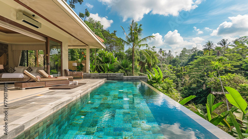 A luxury villa with a poolside view of a tranquil forest.