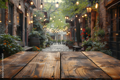 Empty wood table with blured street food market background with copy space