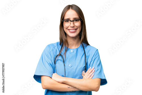 Young nurse caucasian woman over isolated background keeping the arms crossed in frontal position