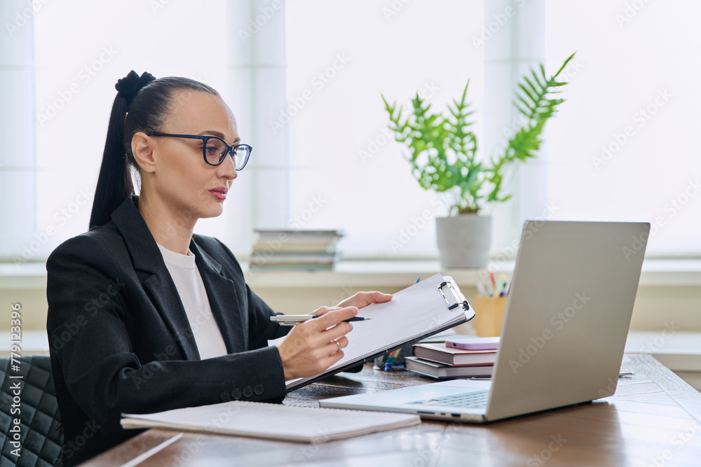 Woman psychologist mental therapist working remotely using computer for online therapy Woman psychologist mental therapist working remotely using computer for online therapy